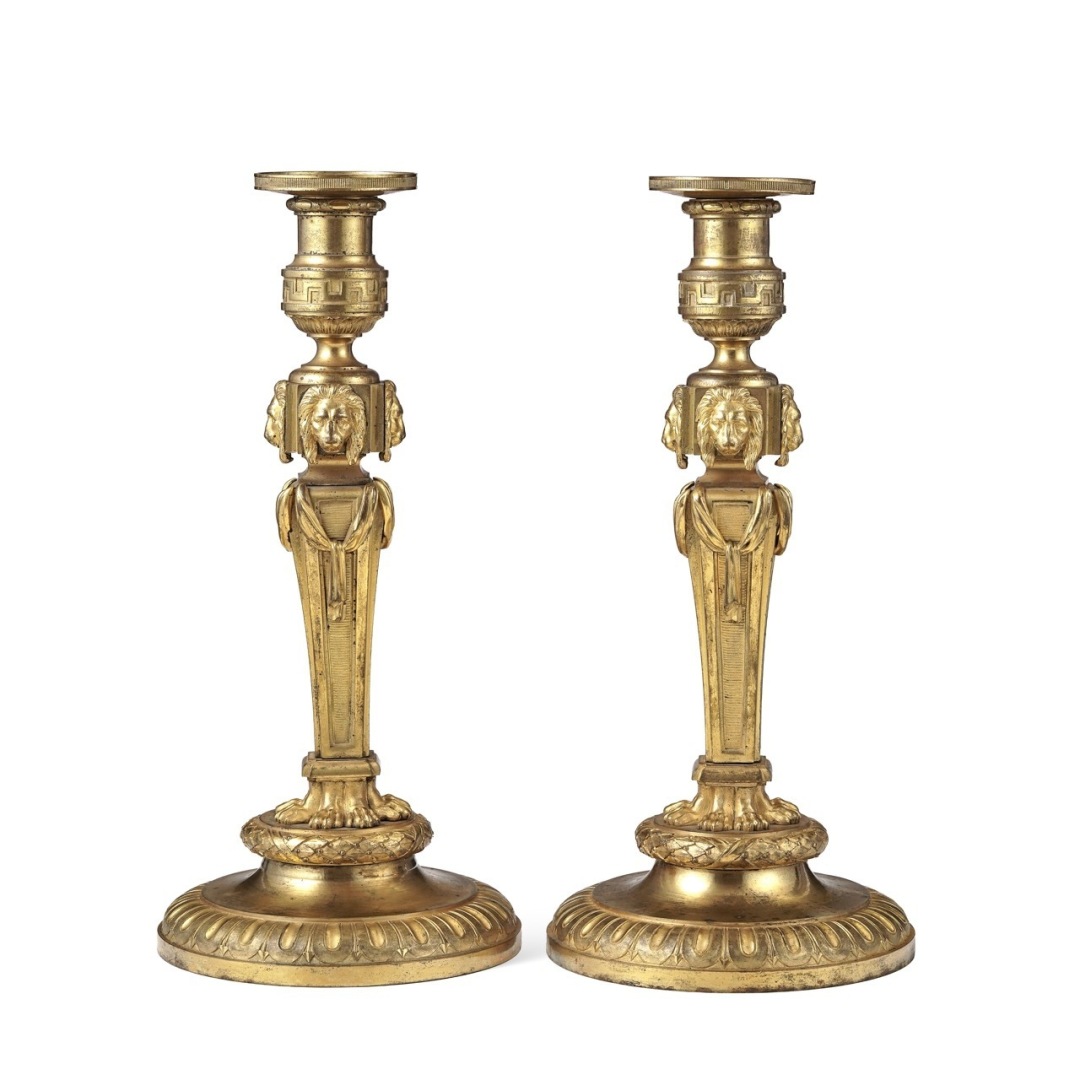 A truly exceptional pair of Louis XV candlesticks A truly exceptional pair of Louis XV candlesticks
