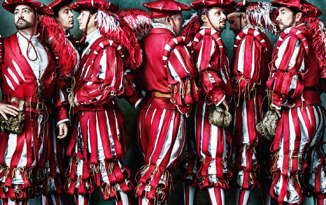 Jungzünfter guild members in Zurich, photographed in theirRed Swiss uniform, on display at PLC gallery in the upper level. Jungzünfter guild members in Zurich, photographed in theirRed Swiss uniform, on display at PLC gallery in the upper level.