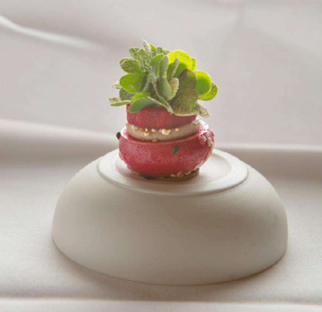 Spring’s amuse-bouche: Beetroot macaron with noix gras and herbs Spring’s amuse-bouche: Beetroot macaron with noix gras and herbs