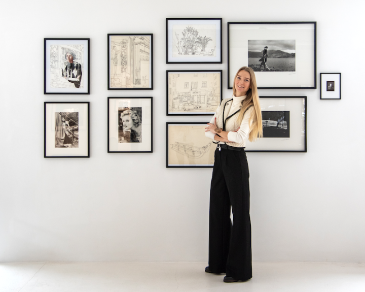 Anna Högl in front of the exhibition wall. A selection of the vintage prints and "Missing Marilyn" photo series by Hannes Schmid, made between 1990 and 1999; Drawings on paper and archival ink sketches by Mikhail Romadin, created between 1991 and 1995.