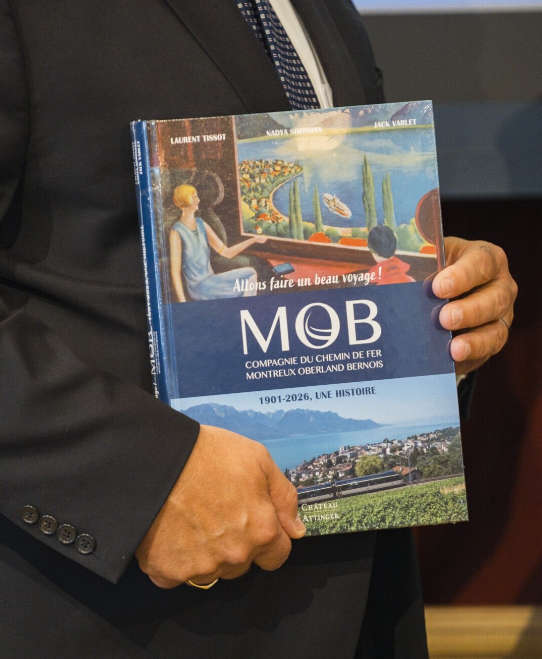 The book "Kommen Sie mit auf eine schöne Reise" traces the history of the MOB. (available in French and German) | PHOTO: JO BERSIER The book "Kommen Sie mit auf eine schöne Reise" traces the history of the MOB. (available in French and German) | PHOTO: JO BERSIER
